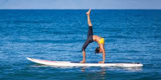 Ho'olei Wailea yoga on surf board